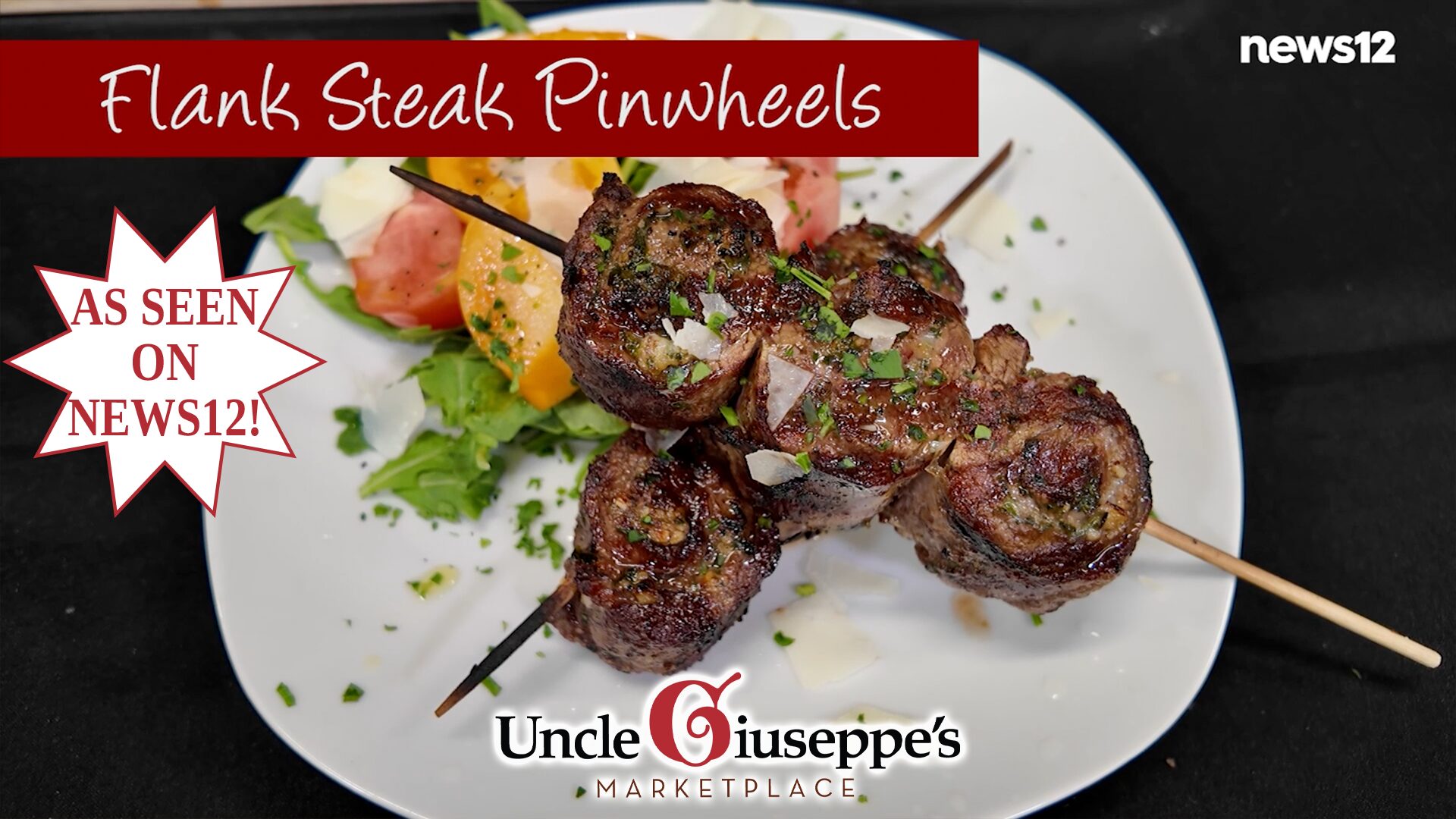 Flank steak pinwheels on skewers on a white plate
