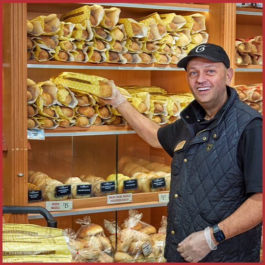 Uncle Giuseppe's worker grabbing bread