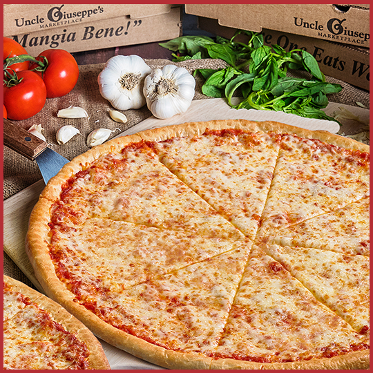 Uncle Giuseppe's pizza pie and boxes