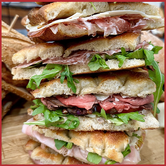 Stack of Uncle Giuseppe's schiaccata sandwiches