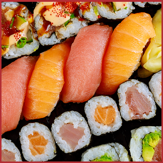 Close up of sushi rolls and sashimi